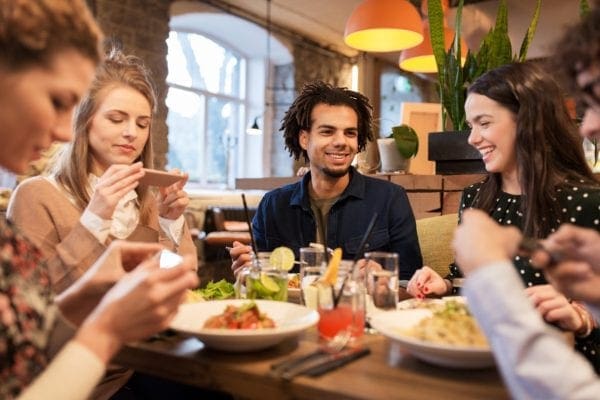 Attract Millennials to your restaurant with social media, healthy options, and social responsibility